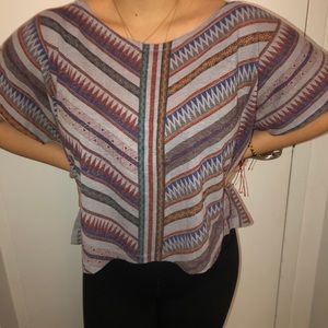 Tribal pattern tee shirt.